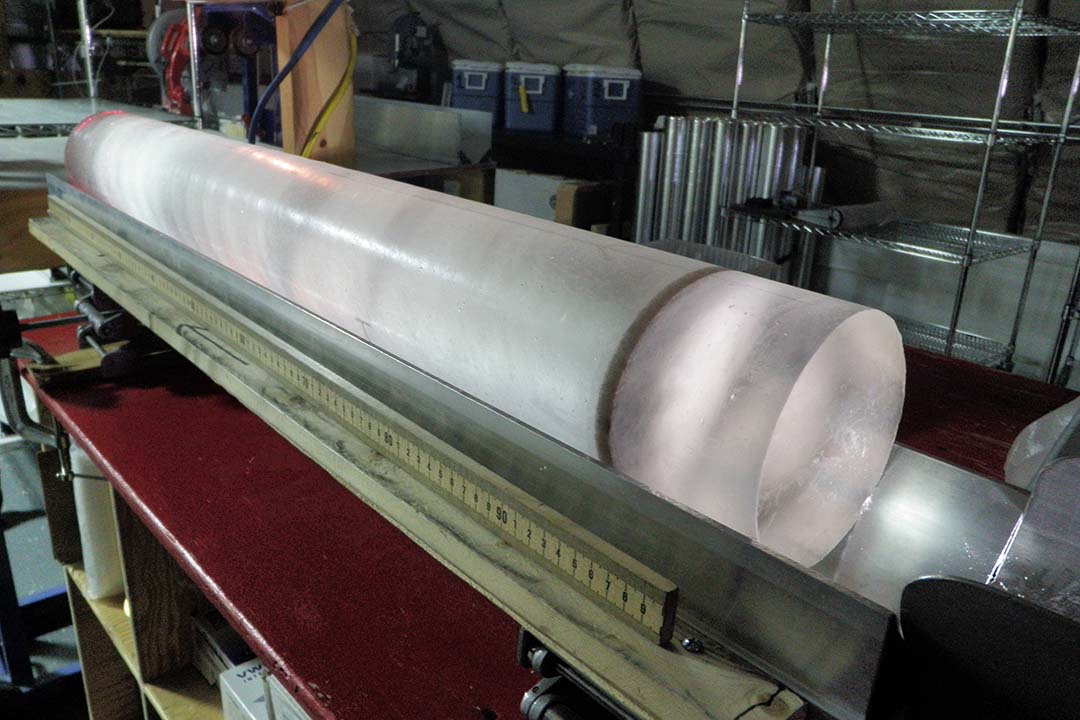 One-meter-long ice core with an ash layer from a volcanic eruption. (Photo: Submitted)