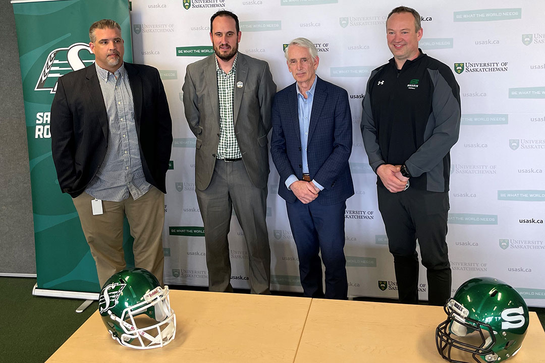 (L-R) Roughriders General Manager Jeremy O'Day and President/CEO Craig Reynolds, USask President Peter Stoicheff and Huskies Head Coach Scott Flory. (Photo: Submitted)