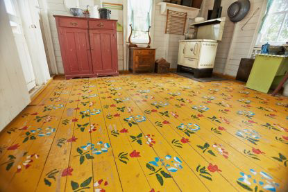 The Summer Kitchen at MHV features a historical Mennonite floor pattern based on one found in a housebarn in Sommerfeld, Manitoba, hand painted by Margruite Krahn. (Photo: Grajewski Fotograph Inc.)