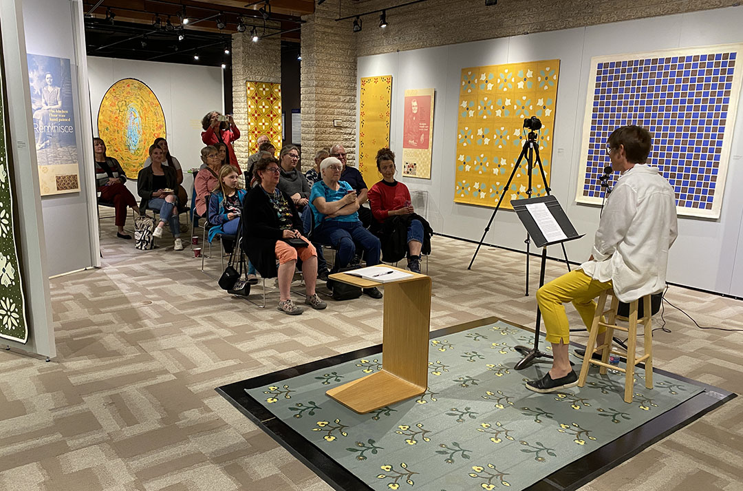 Margruite Krahn giving an artist talk at the exhibit opening. (Photo: Submitted)