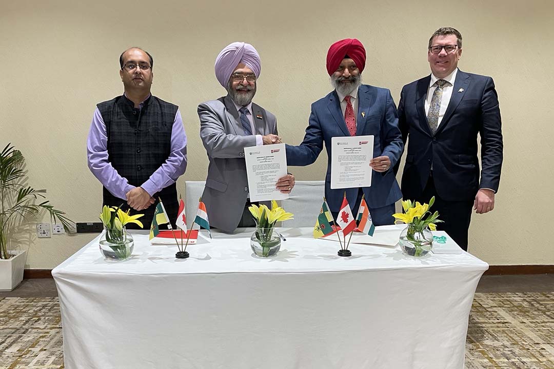 Several USask and government dignitaries pose during a memorandum of understanding signing in India