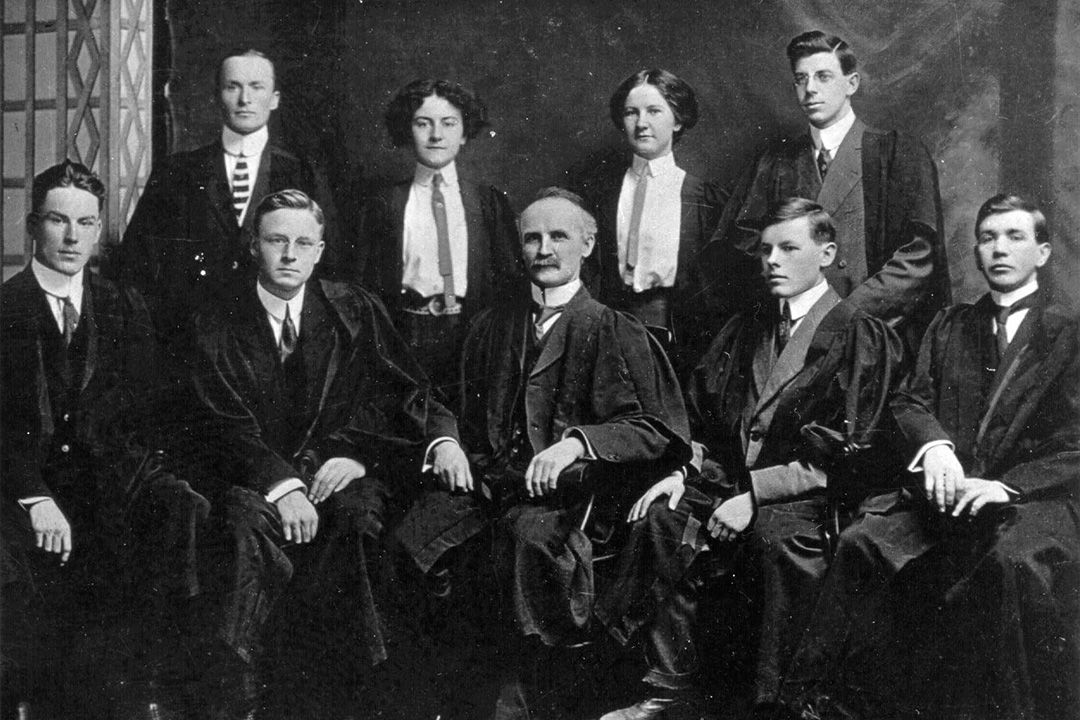 The University of Saskatchewan’s first graduating class: From row middle is President Walter Murray, seated beside John Moore, second from right, with William Exton Lloyd standing in the back right. (Photo: University Archives and Special Collections A-3638)