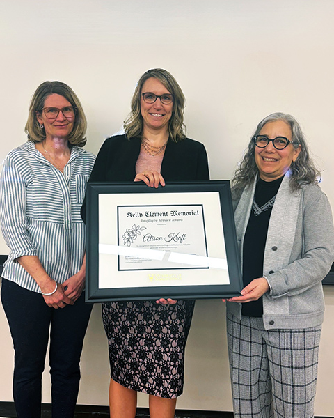College of Education Dean Julia Paulson (left) and CGPS Dean Debby Burshtyn (right) presented Kraft (center) with the award on Mar. 28, 2024 (credit: Kassidy Guy)