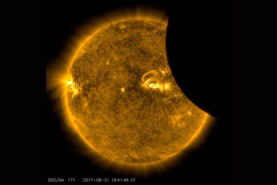 Image of the moon transiting across the sun