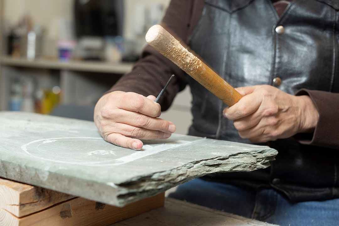 Members of the USask community are invited to come together—with the guidance of stone carver and Indigenous artist-in-residence Lyndon Tootoosis—to create new artwork. (Photo: David Stobbe)