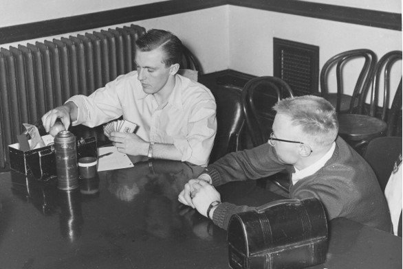 Don Bailey (left) and Terry Flannigan (right) enjoy lunch in the M.A.S.A. lounge in Convocation Hall in 1953. (Photo: Submitted)