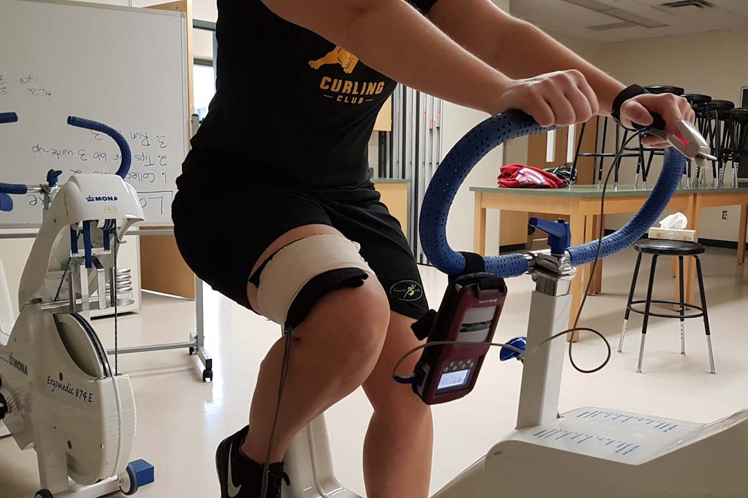 Participants were required to do a brief warm-up on a stationary bike. (Photo: John Ko)