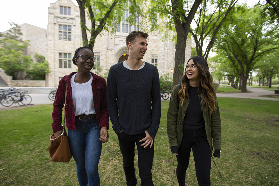 Students pose on campus at the University of Saskatchewan