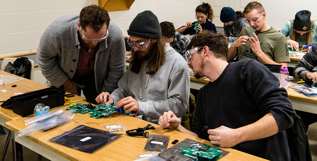Students work on circuit boards in a previous Advanced Hydrology class taught by Dr. Nicholas J. Kinar. (Photo: Nicholas Kinar) 