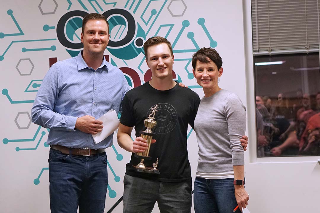 Dawson Norrish (centre), CEO and Founder of Arctic Shelf and winner of best startup at Co.Labs’ Co.mmunity night in 2019, celebrates with judges Alix Hayden, Associate Director of USask Research Excellence and Innovation and Mark Thompson, Executive Vice President and Chief Corporate Development and Strategy Officer at Nutrien. Co.Labs and USask have signed a new MOU to collaborate on highlighting innovation in the province. (Photo: Submitted)