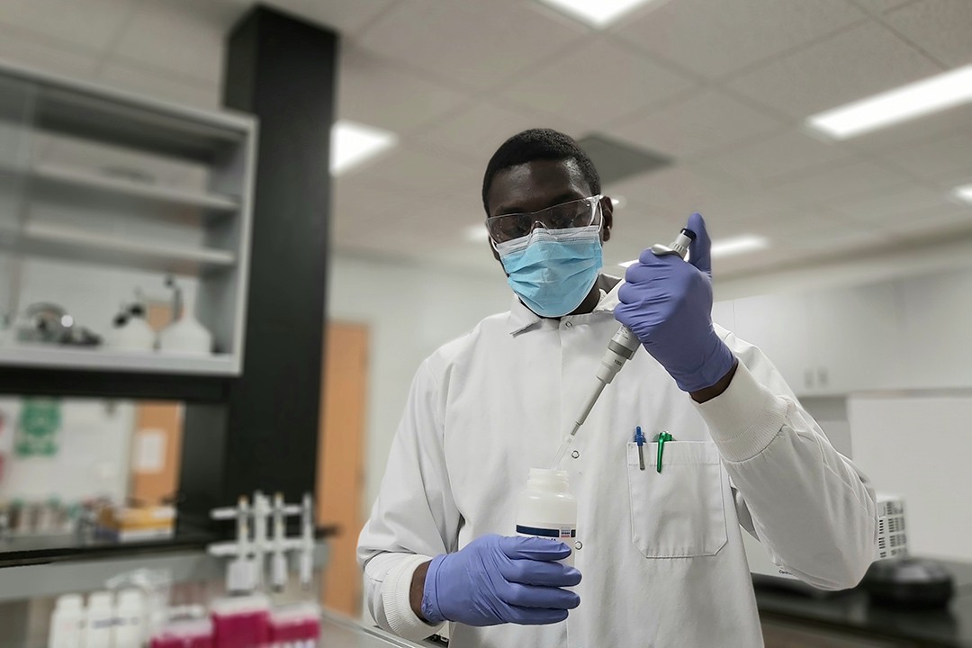 Stephen Awodele, a USask Master of Science in plant sciences student, extracting genomic DNA of soil microbes for sequencing. (Photo: Submitted)