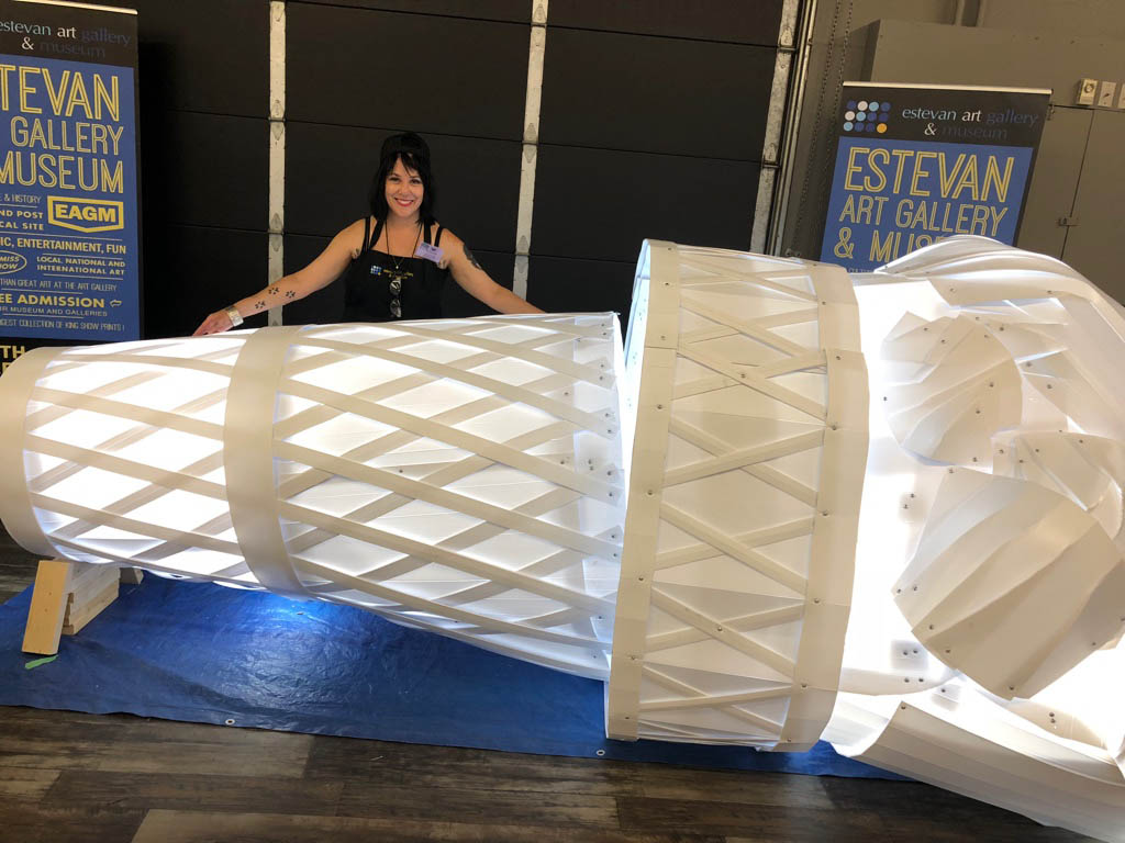 Alison Norlen is pictured with her ice cream sculpture in Estevan, Sask. (Photo: supplied)