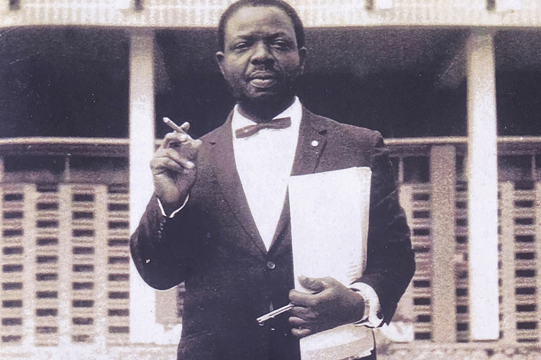 USask alumnus Dr. Theodoric (Ted) Nwafor Chukwulobe Agulefo (MD) holding the original Biafran constitution that he signed during the Nigerian Civil War. (Photo: Submitted)