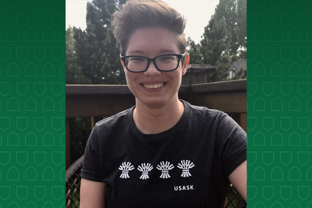 Photo of University of Saskatchewan student Emily Pickett, smiling, wearing USask shirt. 