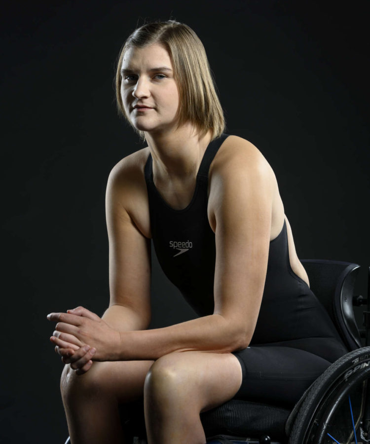 USask graduate Shelby Newkirk with her gold medal from the World Para Swimming Championships in Portugal.