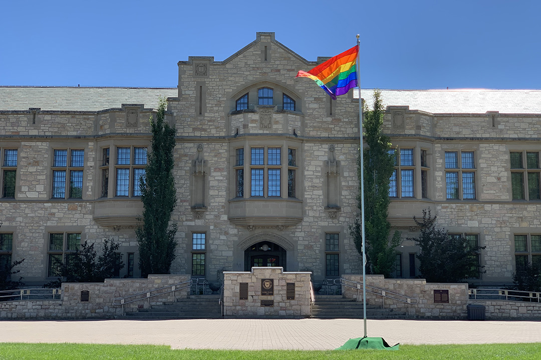 A Pride flag on campus in the Nobel Plaza.