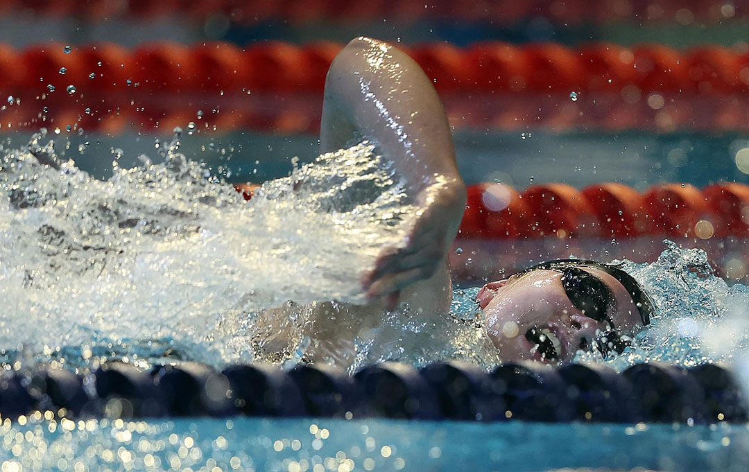 USask graduate Shelby Newkirk with her gold medal from the World Para Swimming Championships in Portugal.