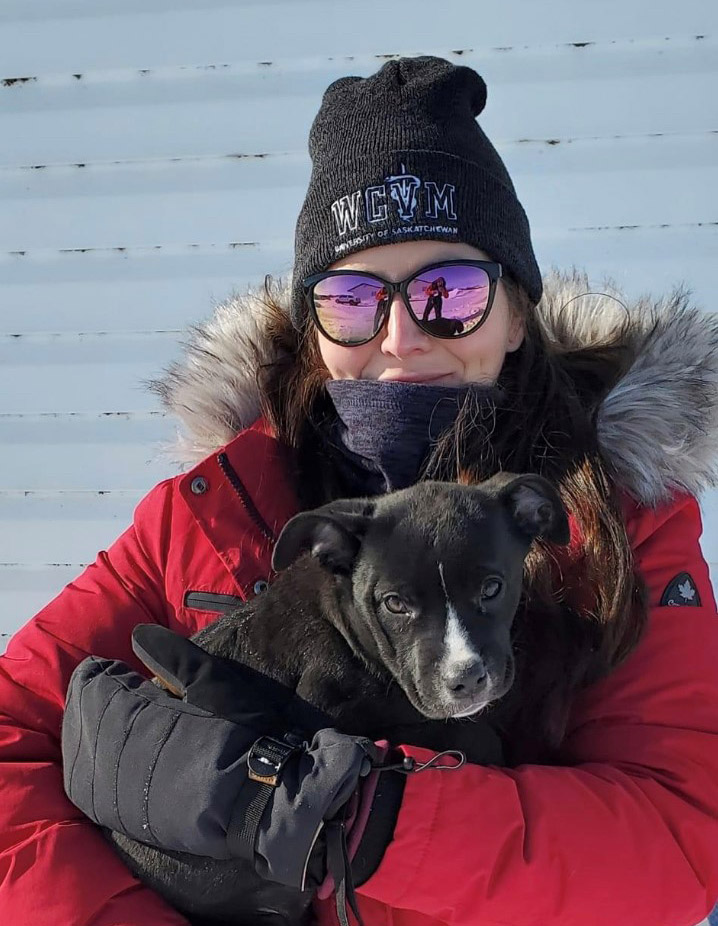 Charlie Wyatt-Swain volunteering with Canine Action Project at One Arrow First Nation. (Photo: Submitted)