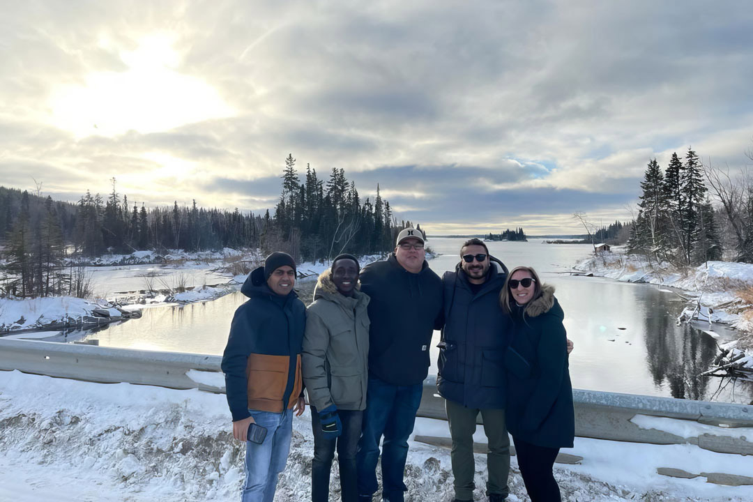 Left to right: USask master’s students Didar Islam and Silas Asante; D. Drew Dorion, Pelican Narrows community energy coordinator; Omar Farag of QUEST Canada; and Rebecca Jahns of Co-Mapping Solutions Inc. at Pelican Narrows on Nov. 7, 2022.
