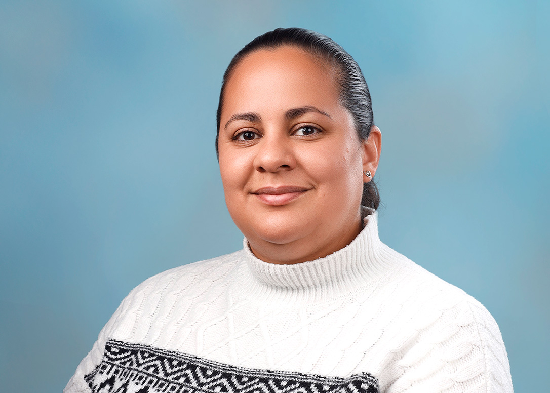 Dr. Ana Vargas headshot, on light blue background