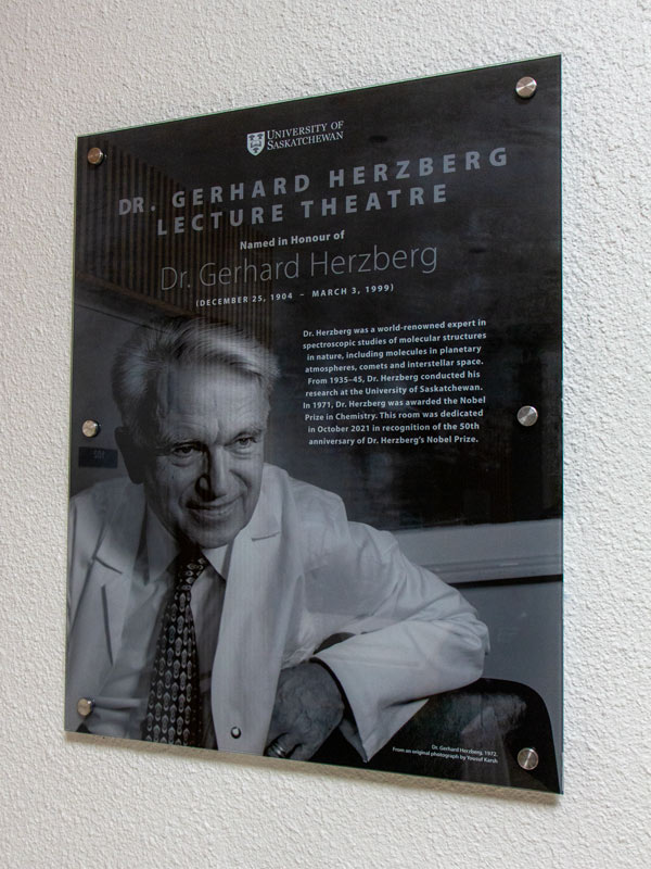 The plaque outside the Dr. Gerhard Herzberg Lecture Theatre. 
