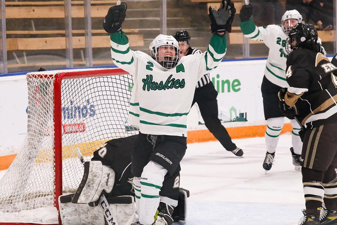 Captain Kennedy Brown of the Huskie women’s hockey team celebrates a goal at Merlis Belsher Place. (Photo: GETMYPHOTO.CA)