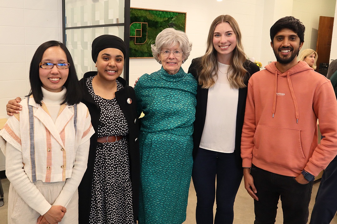 Graduate students taking courses offered through the centre join Jane Graham at the grand opening on April 20. From left to right: Marie Rogel, Harjot Kaur, Jane Graham, Amy Miller and Sai Kumar). (Photo: Submitted)