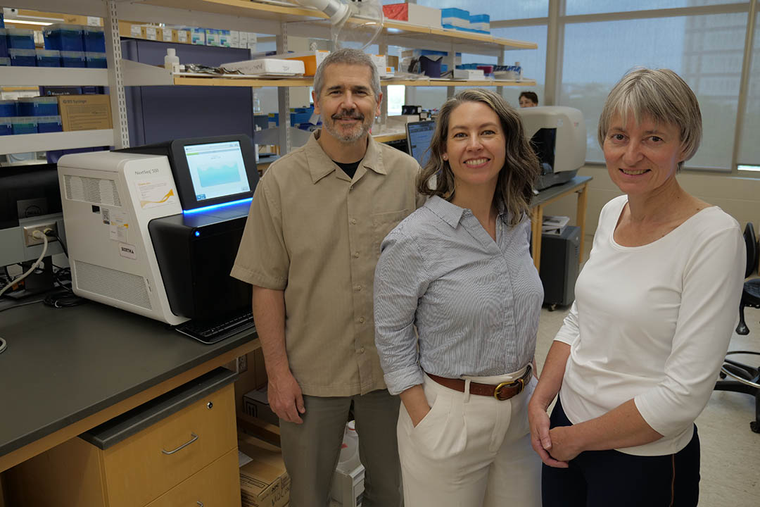 USask researchers Dr. John DeCoteau, Dr. Mary Kinloch, and Dr. Laura Hopkins with a new, next-generation genetic sequencer. (Photo: Daniel Hallen)