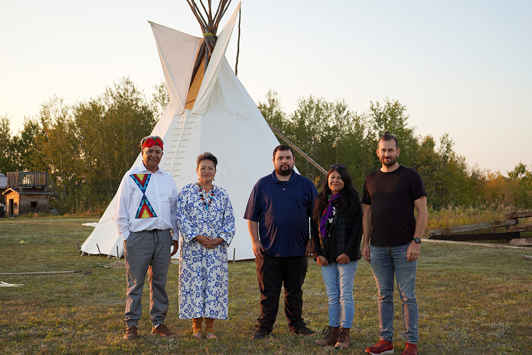 Researchers from Onion Lake Cree Nation, Ralph Morin and Dolores Pahtayken (left), stand with researchers from Pewaseskwan (the Indigenous Wellness Research Group), Jarrett Crowe (centre), Anne Mease (second from the right), and Luke Heidebrecht (right).