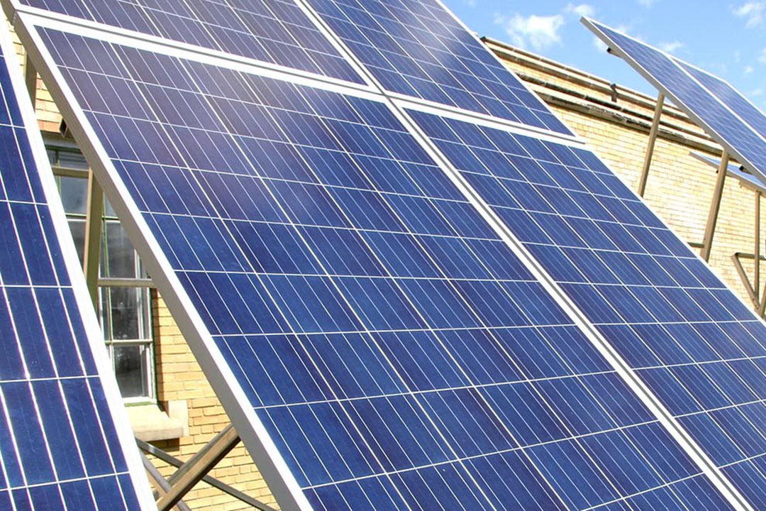 The sun shines on the University of Saskatchewan’s solar module (panel) array located at the John Mitchell Building. 