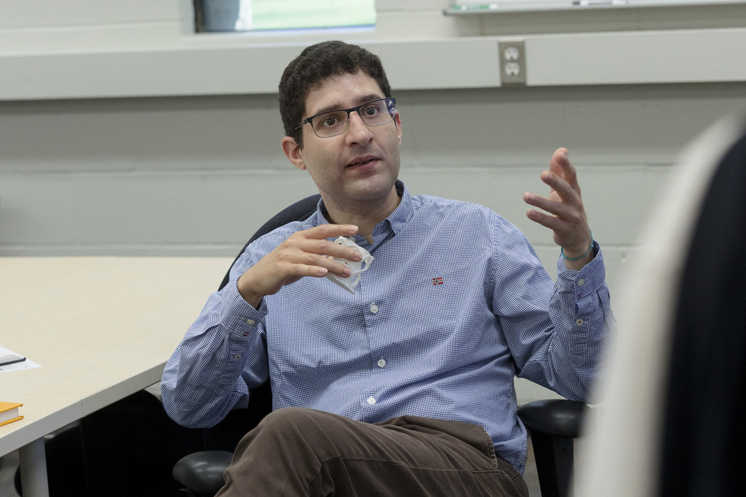 Dr. Steven Rayan (PhD) chats with students in the Centre for Quantum Topology and Its Applications at the University of Saskatchewan.