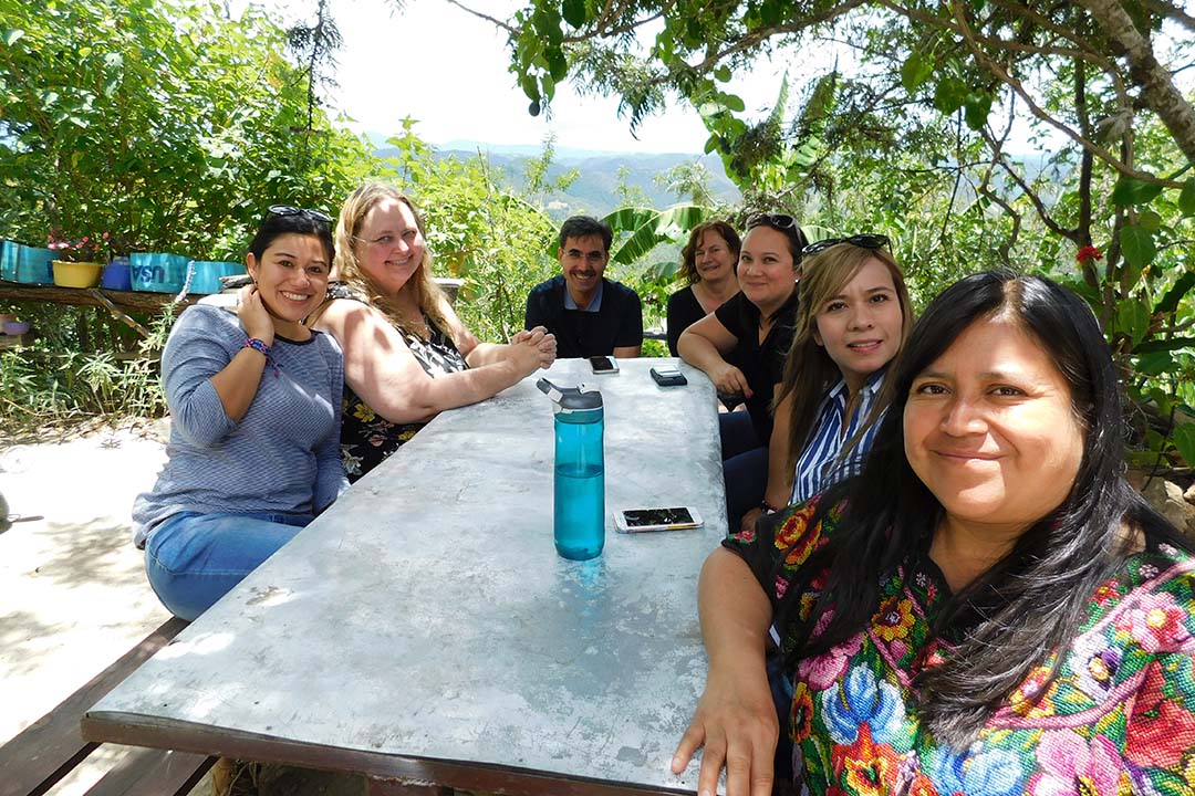The initial meeting between Dr. Hassan Vatanparast and Dr. Ginny Lane (at head of picnic table) with the community about the project in Momostenango, Guatemala. (Photo: Submitted)