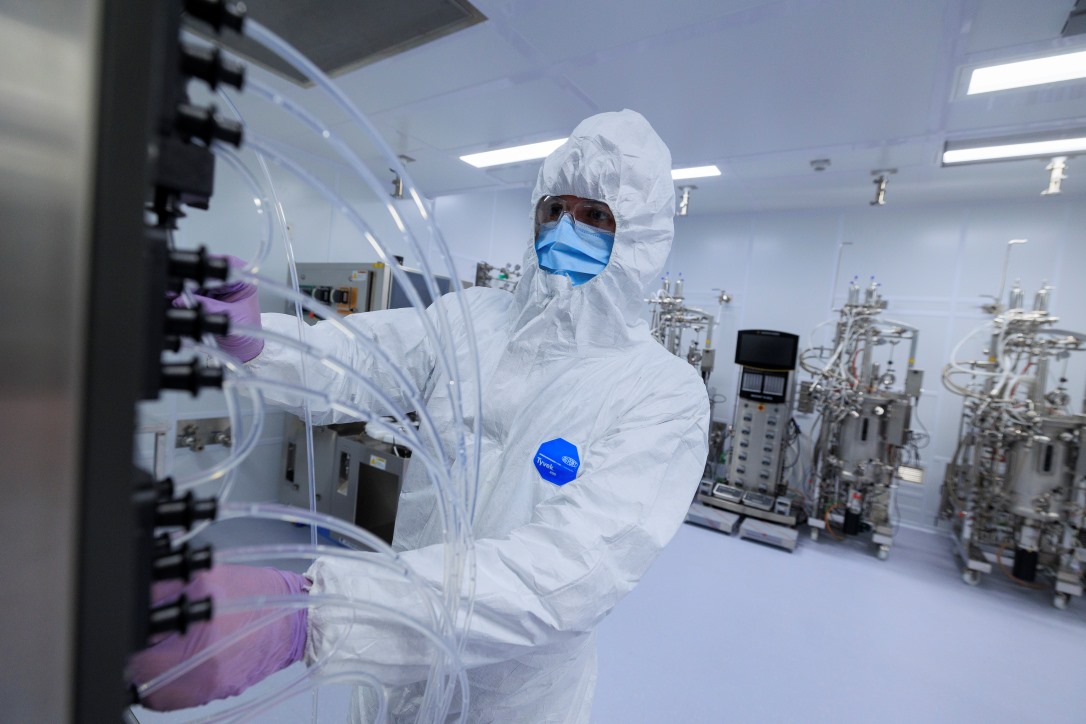 A scientist in a containment suit working in a laboratory at the University of Saskatchewan Saskatoon campus