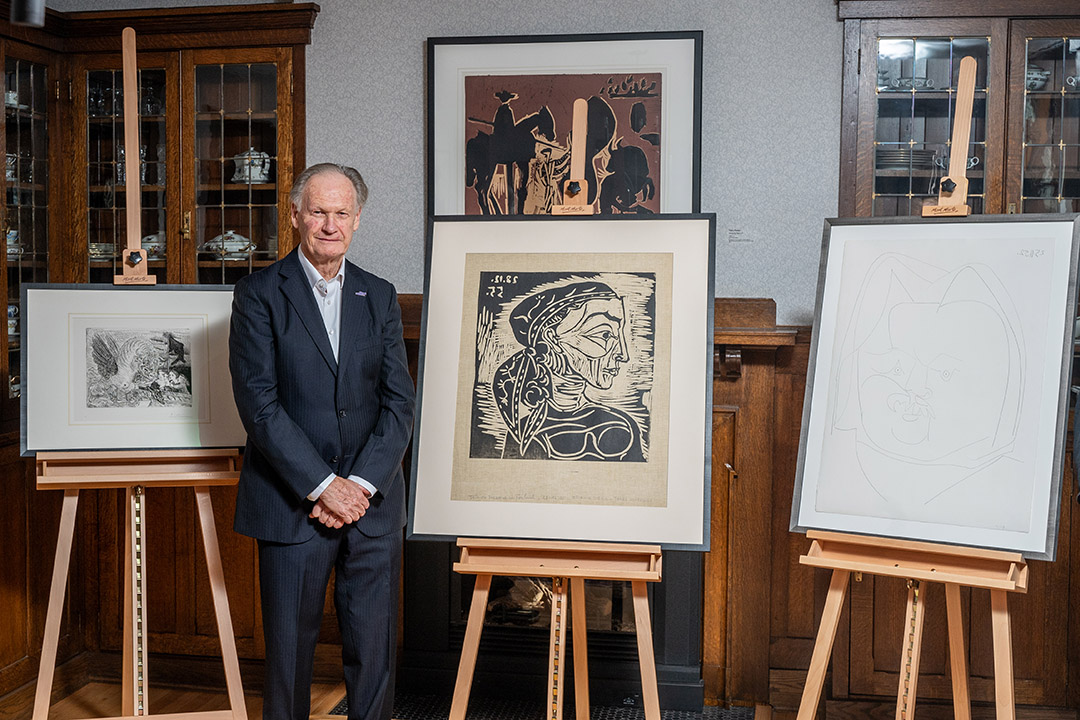 USask alumnus Dr. Frederick Mulder (PhD) and his donation of three prints by Pablo Picasso, with USask President Peter Stoicheff (left) and Kathryn Warden (right). (Photo: Matt Smith)