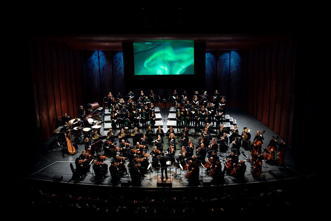 An image of the Greystone Singers performing with the Saskatoon Symphony Orchestra in February 2023. (Photo: SSO / Julie Isaac)