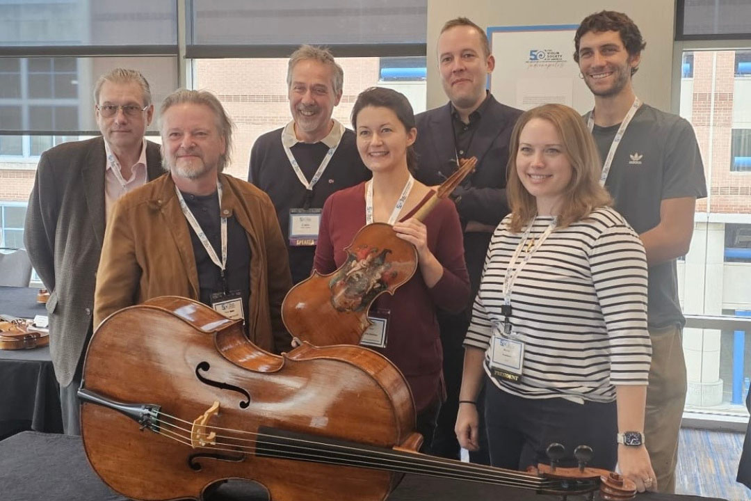 L-R: Philip Cass, Peter Radcliff, Carlo Chiesa, Véronique Mathieu, VSA President Colin Makia, Tommaso Chiesa and Kristin Ballenger at a display of USask’s Amati instruments. (Photo: Submitted)