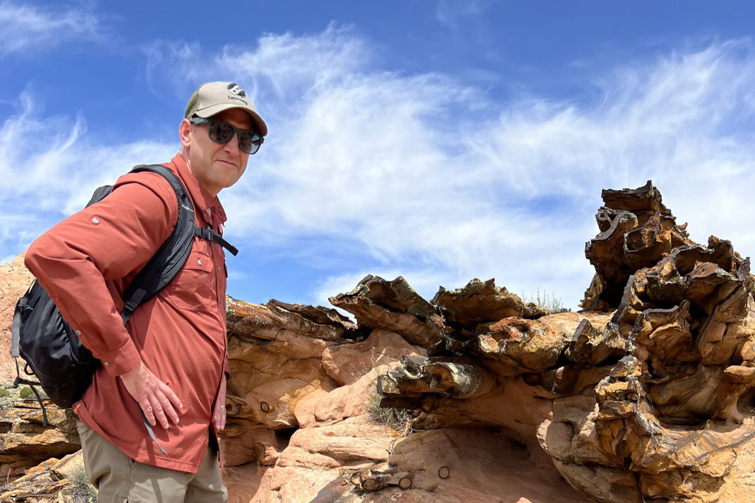 Dr. Grant Ferguson (PhD) pictured at a Utah field site where rock outcrops are used by researchers to interpret how groundwater flow systems have evolved over millions of years. (Supplied: Photo by Jen McIntosh) 