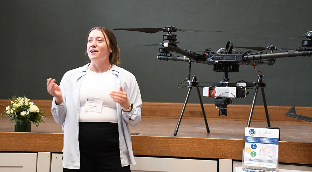 Maddie Harasyn, a research technician with the Canmore Coldwater Laboratory, shows off drone technology at the Global Water Futures Observatories launch event on April 17, 2024. (Photo: Matt Olson)