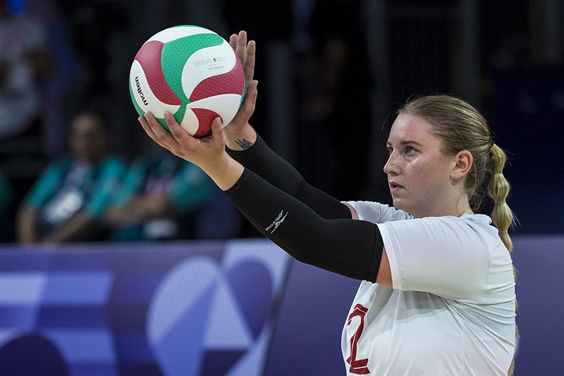 From left: USask alumna Shelby Newkirk is awarded her bronze medal in the women’s S6 100m backstroke at the Paralympic Games in Paris, France on September 7. (Photo: Ian MacNicol, Swimming Canada). USask agribusiness alum Julie Kozun was a member of Canada’s sitting volleyball team in the Paris Paralympics. (Photo: Volleyball Canada)