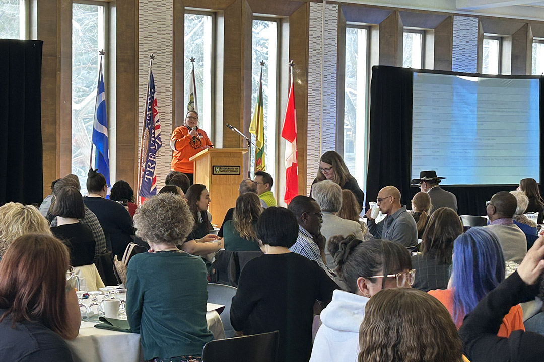 Dr. Angela Jaime (PhD), USask’s vice-provost, Indigenous Engagement, speaks at the podium during last month’s symposium. (Photo: Ashley Dopko)