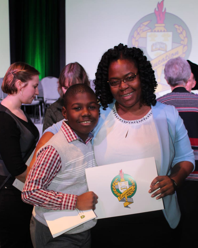 Dr. Tenneisha Nelson is pictured at a College of Education awards ceremony with her son, AJ Nelson. (Photo: Submitted)