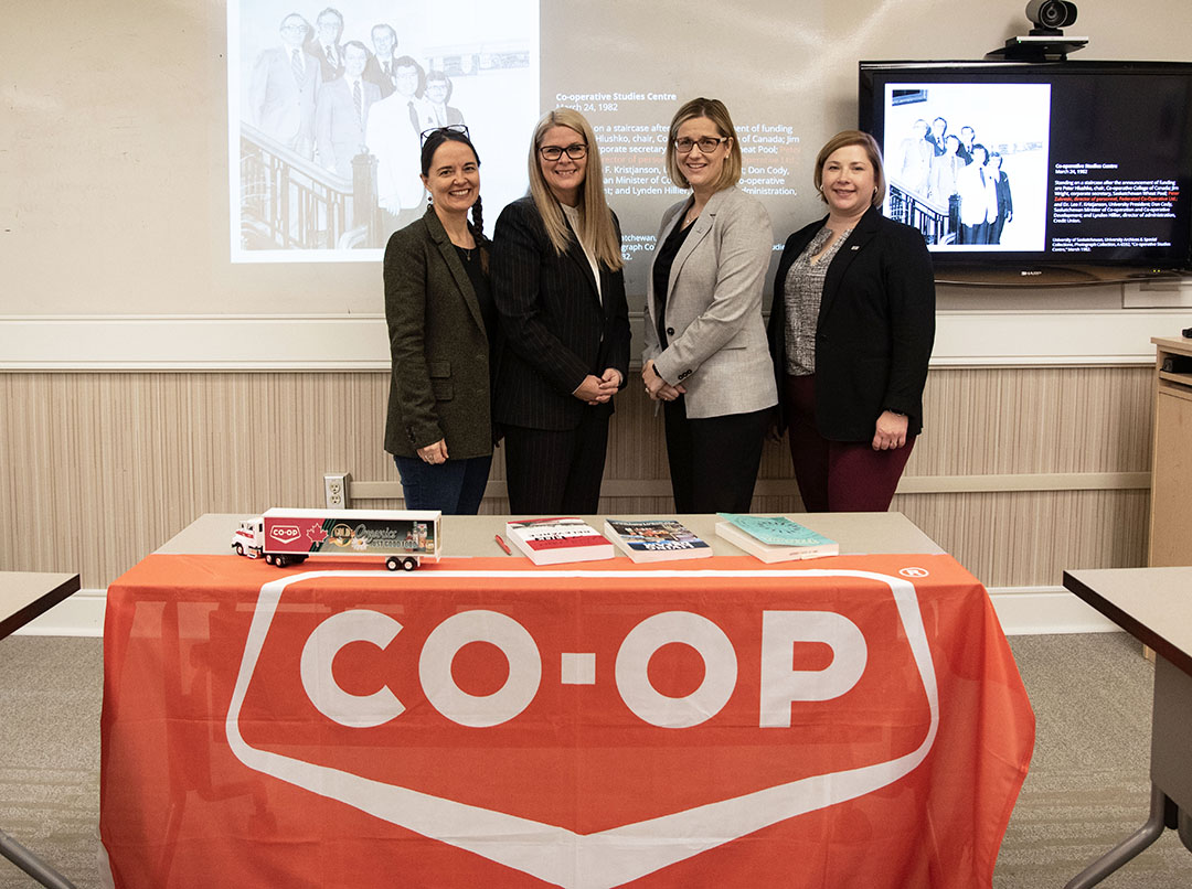 Dr. Dionne Pohler (Co-operative Retailing System Chair in Co-operative Governance), Heather Ryan (FCL CEO), Leanne Hawes (FCL Vice-President, Co-op and External Relations), and Meghan Gervais (FCL Vice-President, Health Safety and Compliance) inside the newly renamed Co-op Collaborative Room at USask. (Photo: June Wilson, FCL)