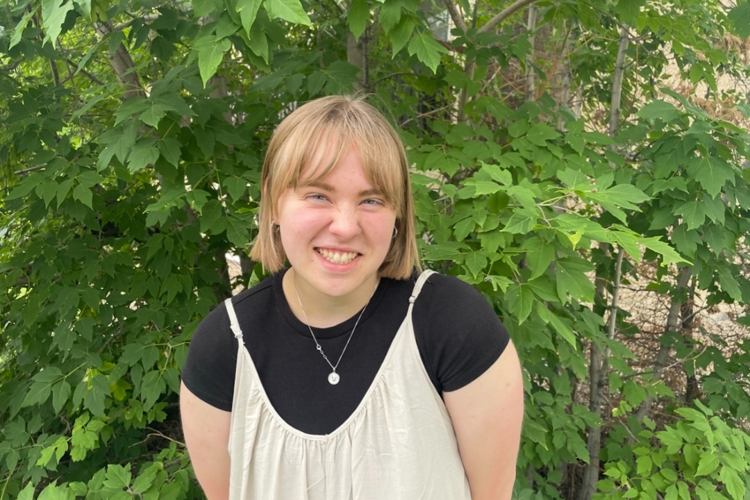 Emma Wintermute on a greenery background