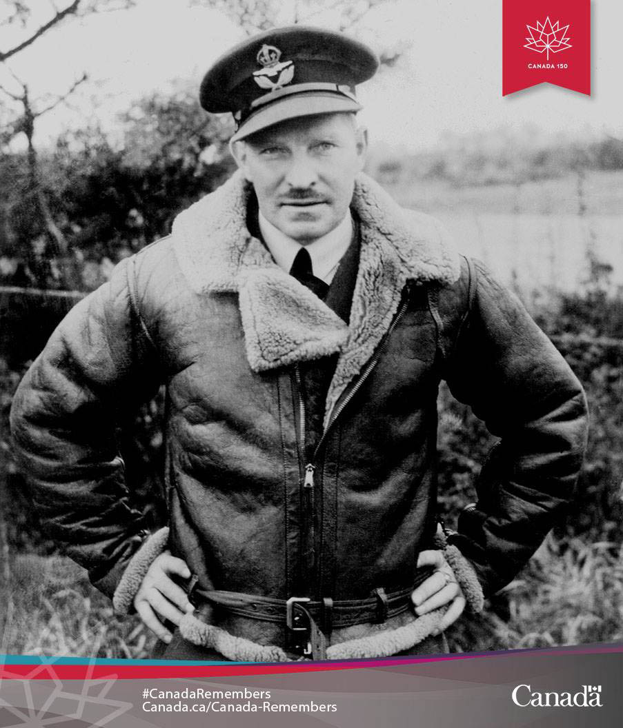 Squadron Leader Ernie McNab (fifth from right) and his fellow pilots from No.1 Squadron RCAF with one of their Hawker Hurricanes in Scotland on Oct 30, 1940. (Photo: Imperial War Museum)