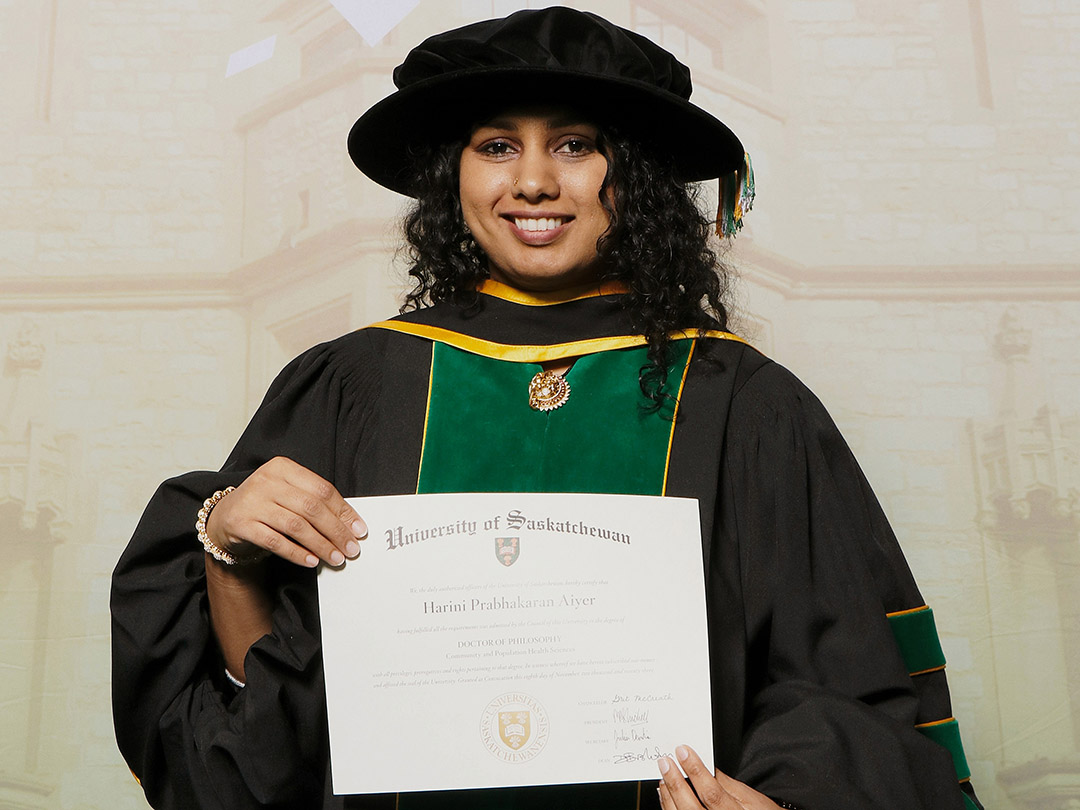 USask alumnae Dr. Harini Aiyer (PhD) at the entrance to the 2025 Canadian Cancer Research Conference that she played a leading role in organizing. (Photo: Submitted)