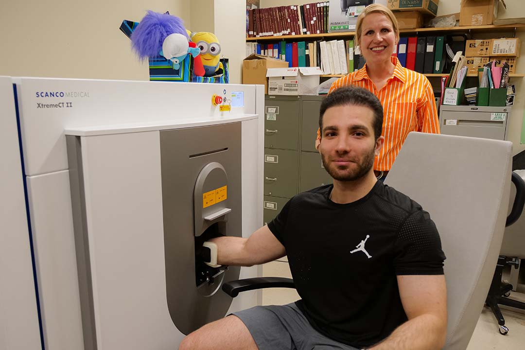 Dr. Sajia Kontulainen stands with a second-generation, high-resolution peripheral quantitative computed tomography (HR-pQCT-II) scanner secured by an investment from CFI-JELF (photo: Erin Matthews/USask)