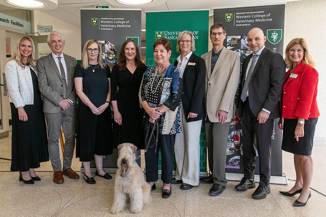 Melissa Mann, WCVM director of development; Peter Stoicheff, USask president; Dana Brass, Saskatoon pet owner; Dr. Monique Mayer, WCVM radiation oncologist; Cathy Roozen, WCVM donor, and her dog Timber; Dr. Gillian Muir, WCVM dean; Keith Lofvendahl, WCVM donor; Vince Bruni-Bossio, USask provost and vice-president of academic; and Cheryl Hamelin, USask vice-president of University Relations.