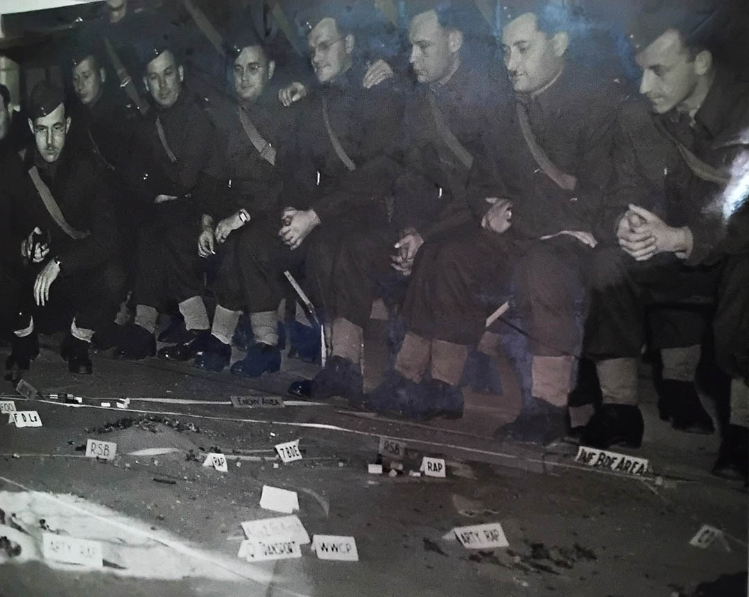 Squadron Leader Ernie McNab (fifth from right) and his fellow pilots from No.1 Squadron RCAF with one of their Hawker Hurricanes in Scotland on Oct 30, 1940. (Photo: Imperial War Museum)