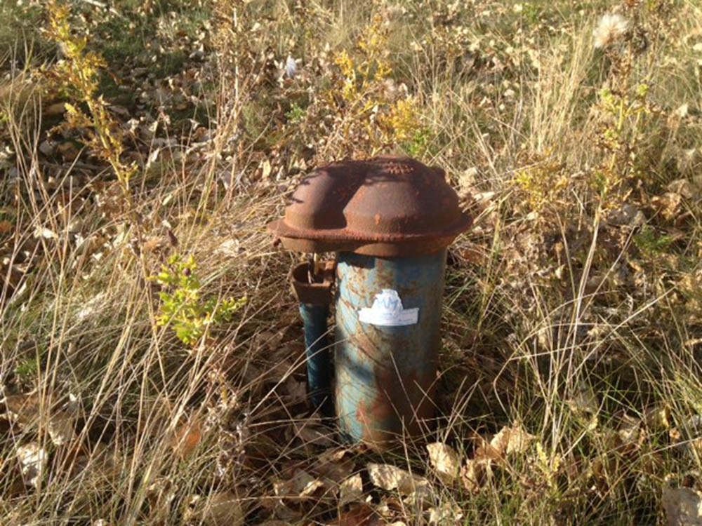 Dr. Bob Patrick (PhD) stands next to a weather station as part of his research in Wollaston Lake, with Hatchet Lake Dene Nation. (Photo: Submitted)