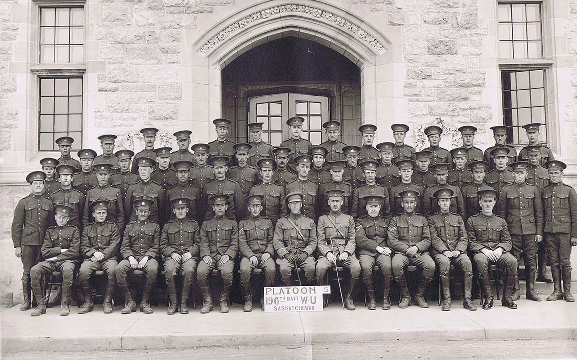 Members of the 196th (Western Universities) Battalion, made up of students, staff and faculty from the University of Saskatchewan, in front of the College Building in 1916. (Photo: USask Archives and Special Collections, RG2104, Item A-1130)